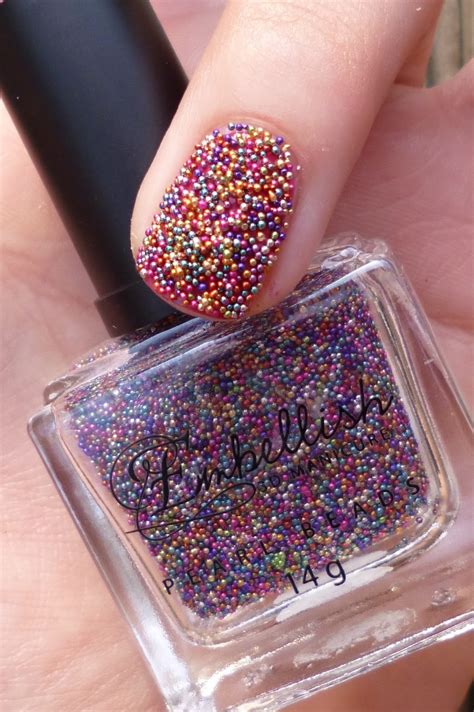 Lou Is Perfectly Polished Caviar Beads And Feather Nails