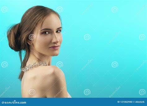 A Beautiful Girl With Naked Shoulders And Nude Makeup Wearing A Stock Photo Image Of Face