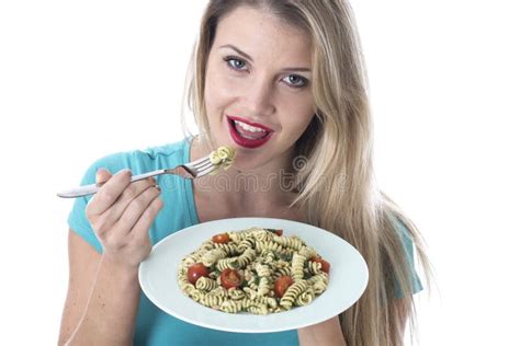 Young Woman Eating Spinach And Pine Nut Pasta Stock Image Image Of Pretty Twenties 34069277