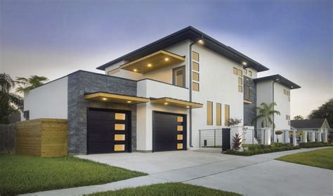 Clopay Modern Steel Collection Garage Doors On A Contemporary Home