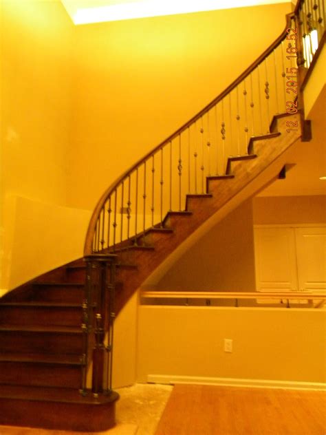 Wood Stairs and Rails and Iron Balusters: Custom Curved Stair Medford NJ