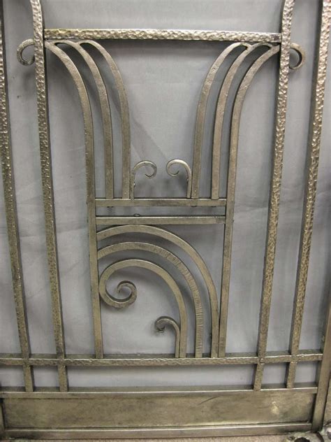 It has a beautifully arched top, twisted legs for stability, and an easy to clean surface. French Art Deco Hammered Iron Fire Screen, Charles Piguet ...