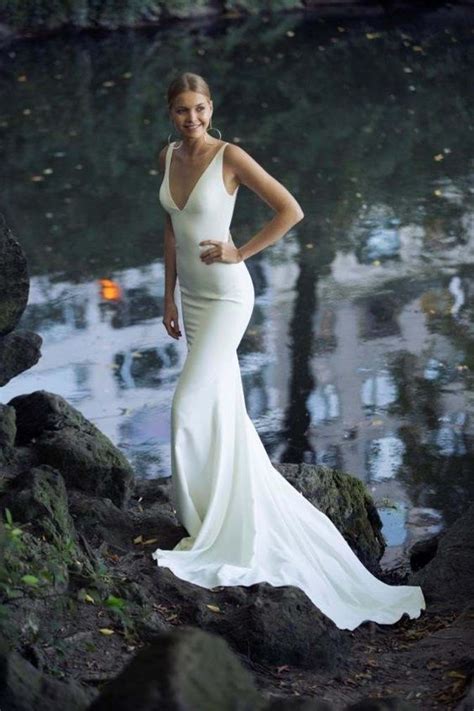 Luxurious fabrics, such as satin and chiffon, with exquisite beading or pearls, give a classy display. Ivory Beach Mermaid Wedding Dresses, Sexy Deep V Neck ...