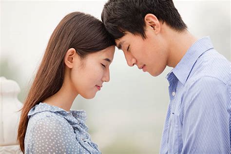 Royalty Free Asian Couple Standing Face To Face Pictures Images And