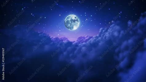 Flying Through Cloudy And Starry Night Sky With Full Moon Loopable