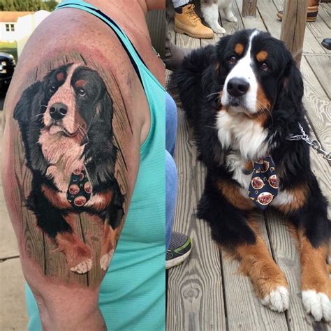 A Woman With A Dog Tattoo On Her Arm Sitting Next To A Mans Shoulder
