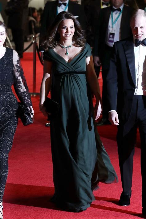 Kate Middleton Shows Off Baby Bump On Baftas Red Carpet Photos