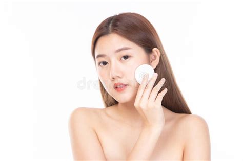 Attractive Beauty Young Asian Woman Clean Skin With Cotton Pad Removing