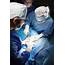 Surgeons Preparing Patient For Cesarean Section Procedure Stock Photo 
