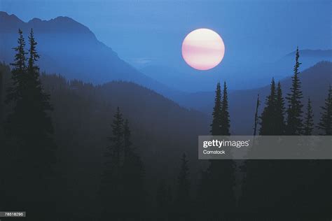 Full Moon Over Mountains High Res Stock Photo Getty Images