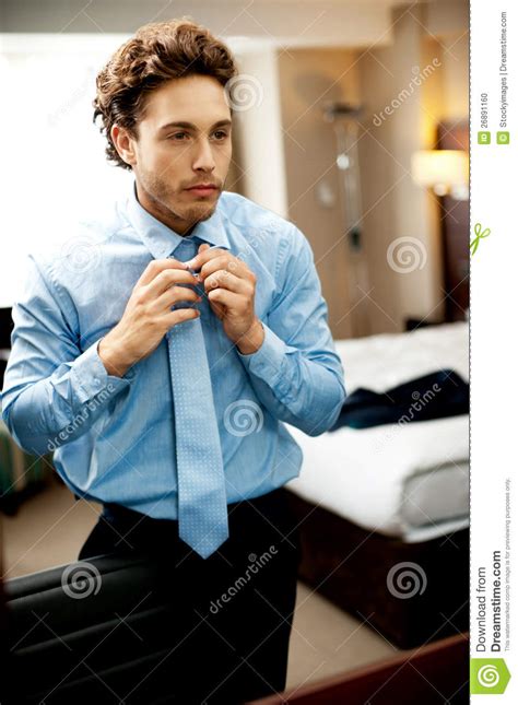 Exhausted Executive Getting Ready For Work Stock Photo - Image: 26891160