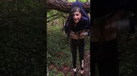 Girl Tries To Show Off While Sitting On A Tree Branch And Ends Up