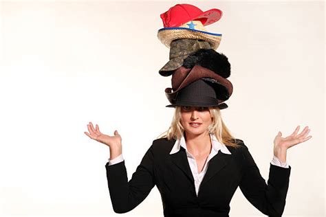 1175600 Woman Wearing Many Hats Stock Photos Pictures And Royalty
