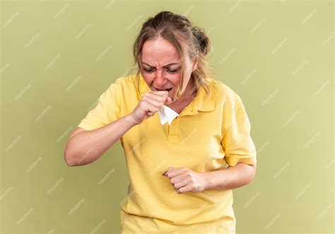 Free Photo Unhealthy Woman In Yellow Shirt Feeling Terrible Suffering