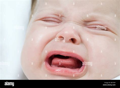 A Baby Girl Crying Stock Photo Alamy