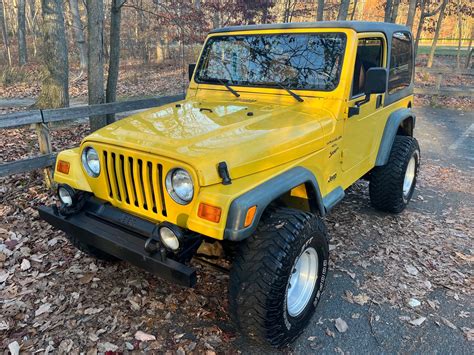 total 70 imagen 2000 jeep wrangler sport yellow vn