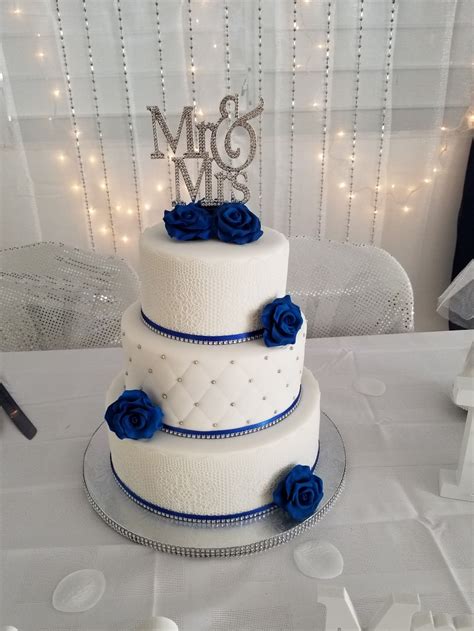 Royal Blue And Silver Wedding Cake With Sugar Lace And Roses