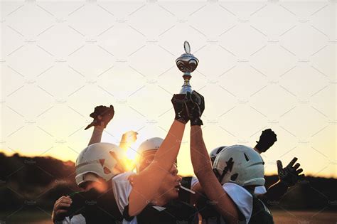 Football Players Celebrating A Championship Sports And Recreation Stock