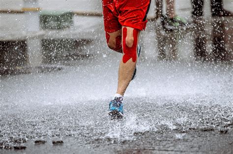the power of running in the rain getting out in inclement weather is… by maxime godfroid