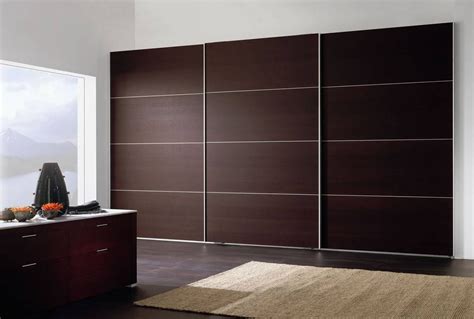 Can't find the right fit? 30 Best Ideas of Dark Wood Wardrobe Sliding Doors