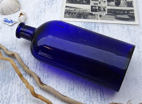 Cobalt Blue Glass Oval Bottle Apothecary Medicine Bottle Etsy Uk Blue Glass Bottles Blue