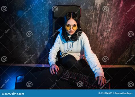 Beautiful Professional Gamer Girl Playing In First Person Shooter