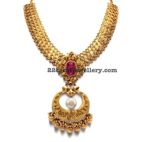Fancy Gold Necklace With Chandbali Locket Jewellery Designs