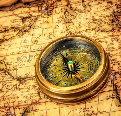 Vintage Still Life Vintage Compass Lies On An Ancient World