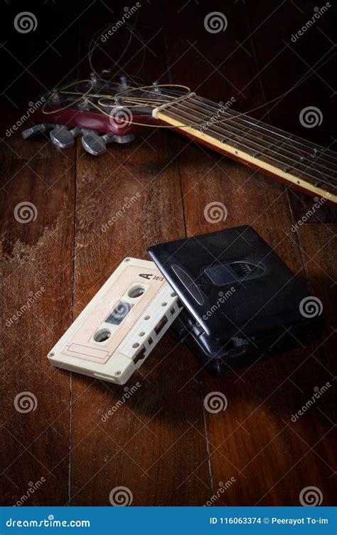 Cassette Tape With Audio Player And Guitar Stock Photo Image Of
