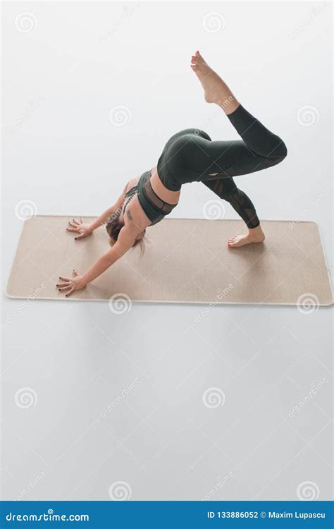 Slim Woman In Sportswear Practicing Yoga Stock Photo Image Of