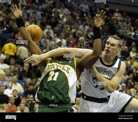 Seattle Supersonics Danny Fortson 21 Is Fouled Hard By Minnesota