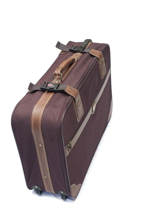 Free Image Of Unmarked Brown Suitcase Freebiephotography