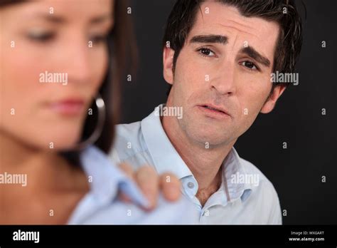Man Trying To Reconcile With Girlfriend Stock Photo Alamy