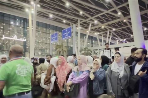 41 filipinos 7 palestinians from war torn gaza arrive in manila abs cbn news