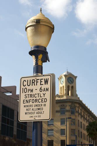 Curfew definition, an order establishing a specific time in the evening after which certain regulations apply, especially that no civilians or other specified group of unauthorized persons may be outdoors or. Curfew Laws - Stupid Laws | Laws.com