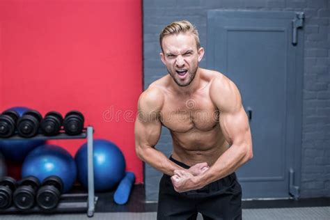 Muscular Man Flexing His Muscles Stock Photo Image Of Healthy