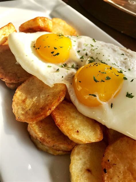 Fried Eggs And Potato Slices