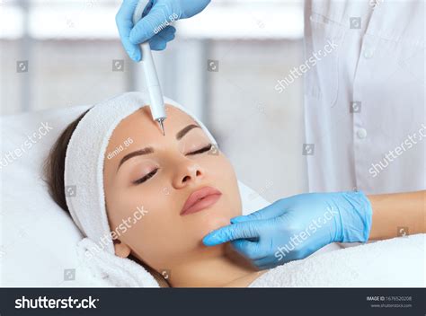 Cosmetologist Makes Procedure Treatment Couperose Face Stock Photo