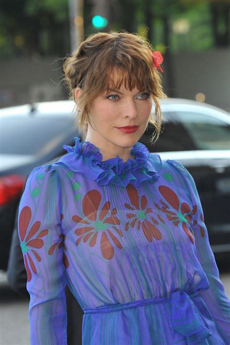 Is Milla Jovovichs Dress Blue Or Purple Either Way It Is Definitely