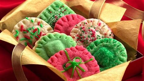 Cookies and christmas go together like, well, cookies and christmas!! Christmas Surprise Sugar Cookies recipe from Betty Crocker