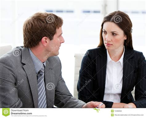 Two Concentrated Business People Talking Together Stock Photo - Image ...