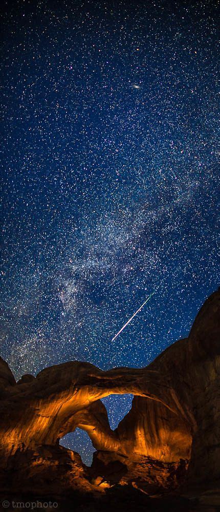 Perseid Meteor Streaking Over The Lightpainted Double Arch In Arches