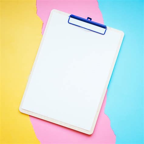 Clipboard On Paper Background Photo Free Download