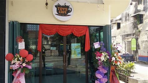 There were three huge dogs in their the cafe is tucked away from the busy city centre of george town, penang. Toys Cafe Penang | VMO