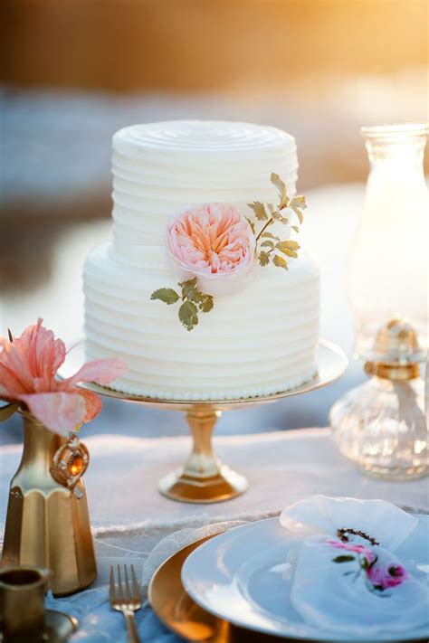 Using a pastry brush, brush the simple syrup on top of each cake layer. 30 WOW Wedding Cakes for 2015 | weddingsonline