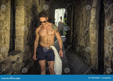 Shirtless Man Walking In Ancient Town Lane Stock Image Image Of
