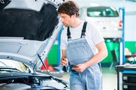 Car Mechanic Working With Tool In Service Workshop Stock Image Image