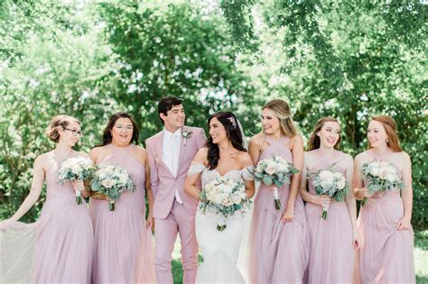 Bridal Party With Bridesmanman Of Honor In Matching Pink Suit