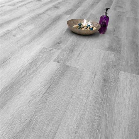 There is slight damage to one of the packs which appears to be caused by the straps. Aqua Plank Shadow Grey Click Vinyl Flooring