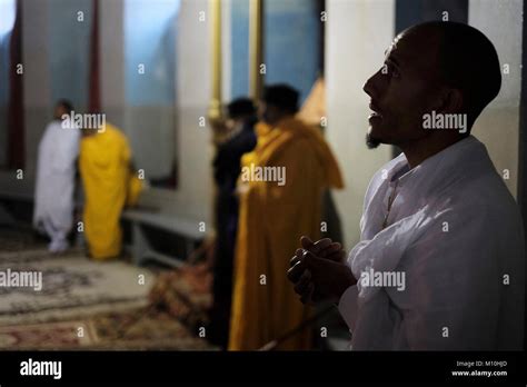 Ethiopian Orthodox Monks Praying Inside The Ethiopian Church Of Kidane